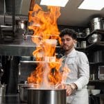 photo chef Quentin Maufrais en cuisine flamme