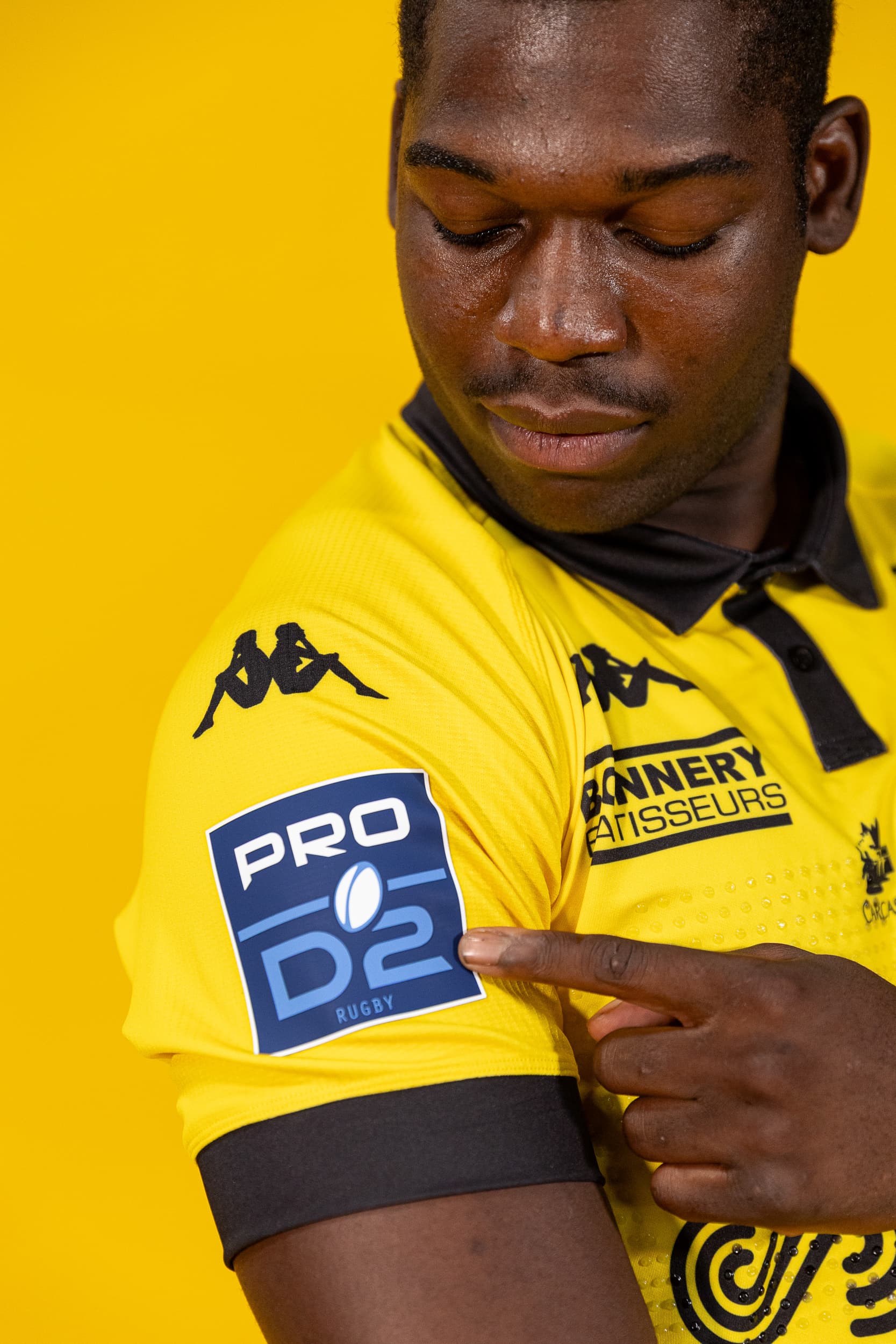 Photographie produit collection textile US Carcassonne Qapture maillot jaune et noir
